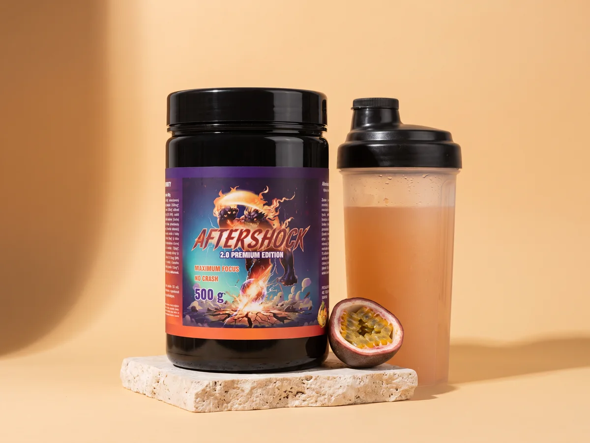 Aftershock tub next to a shaker with the mixed drink